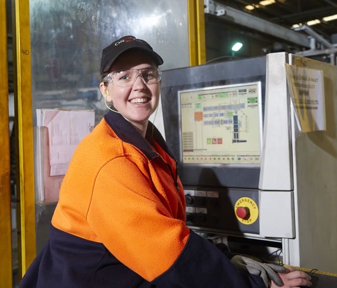 Orora employee at work in factory