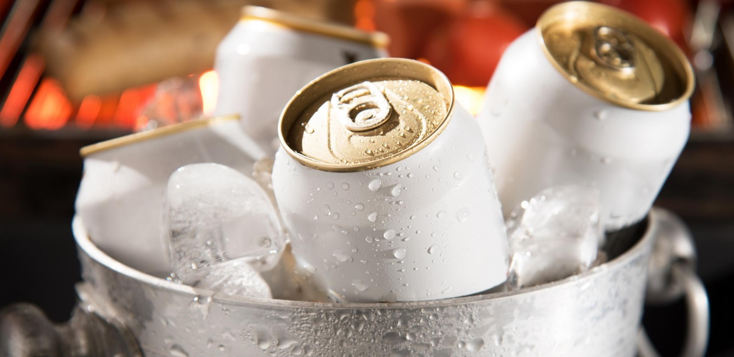 Aluminium cans in ice bucket