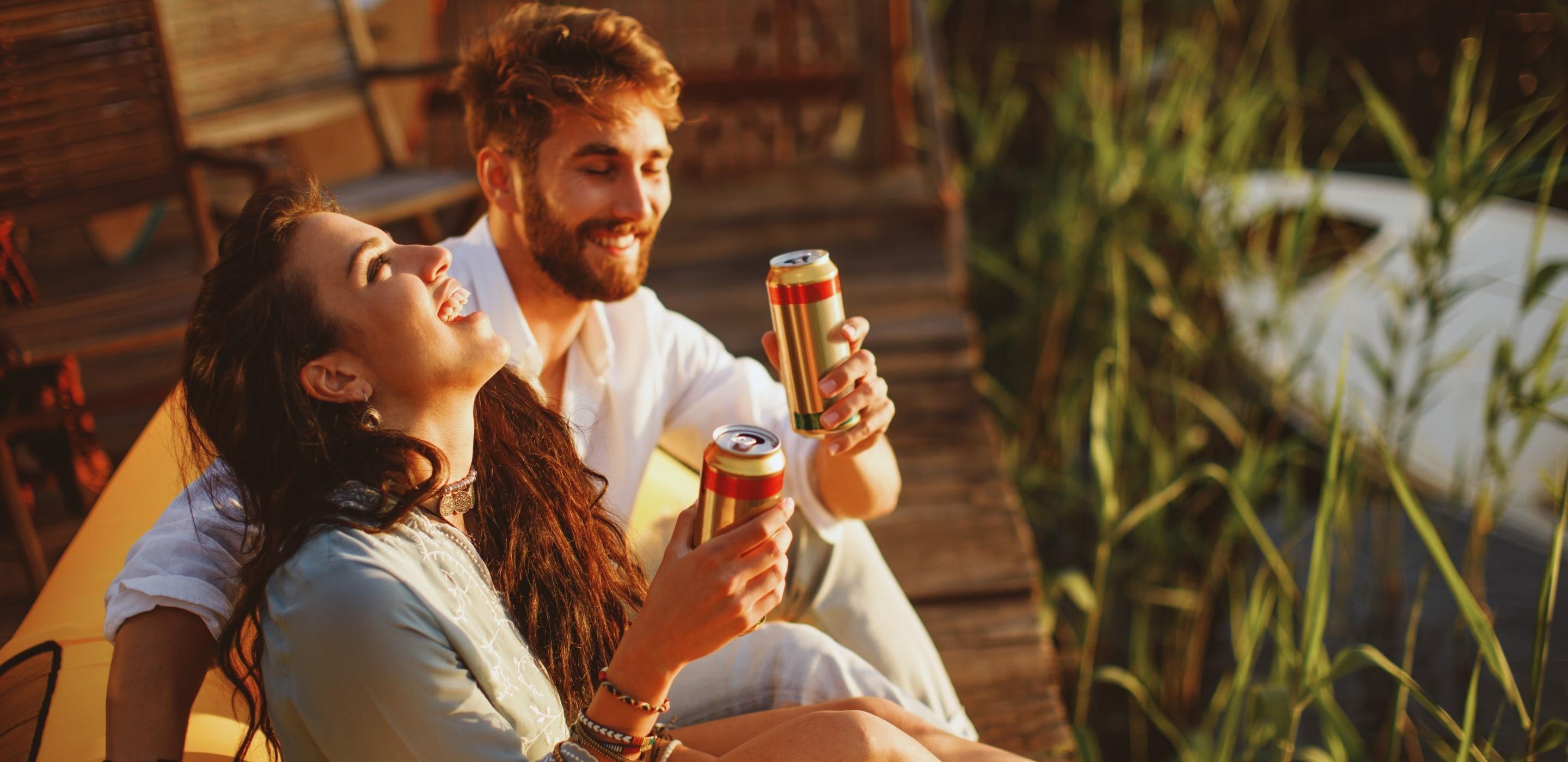 2 People Enjoying with Cans