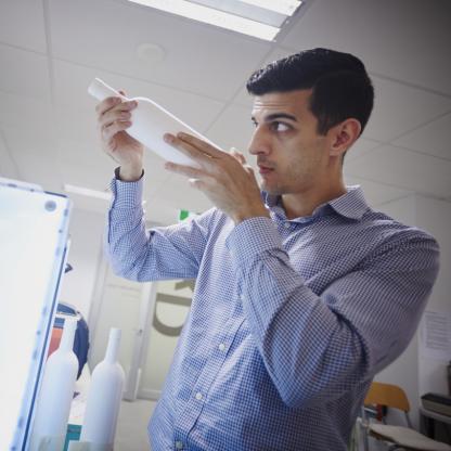 innovation team member holding bottle